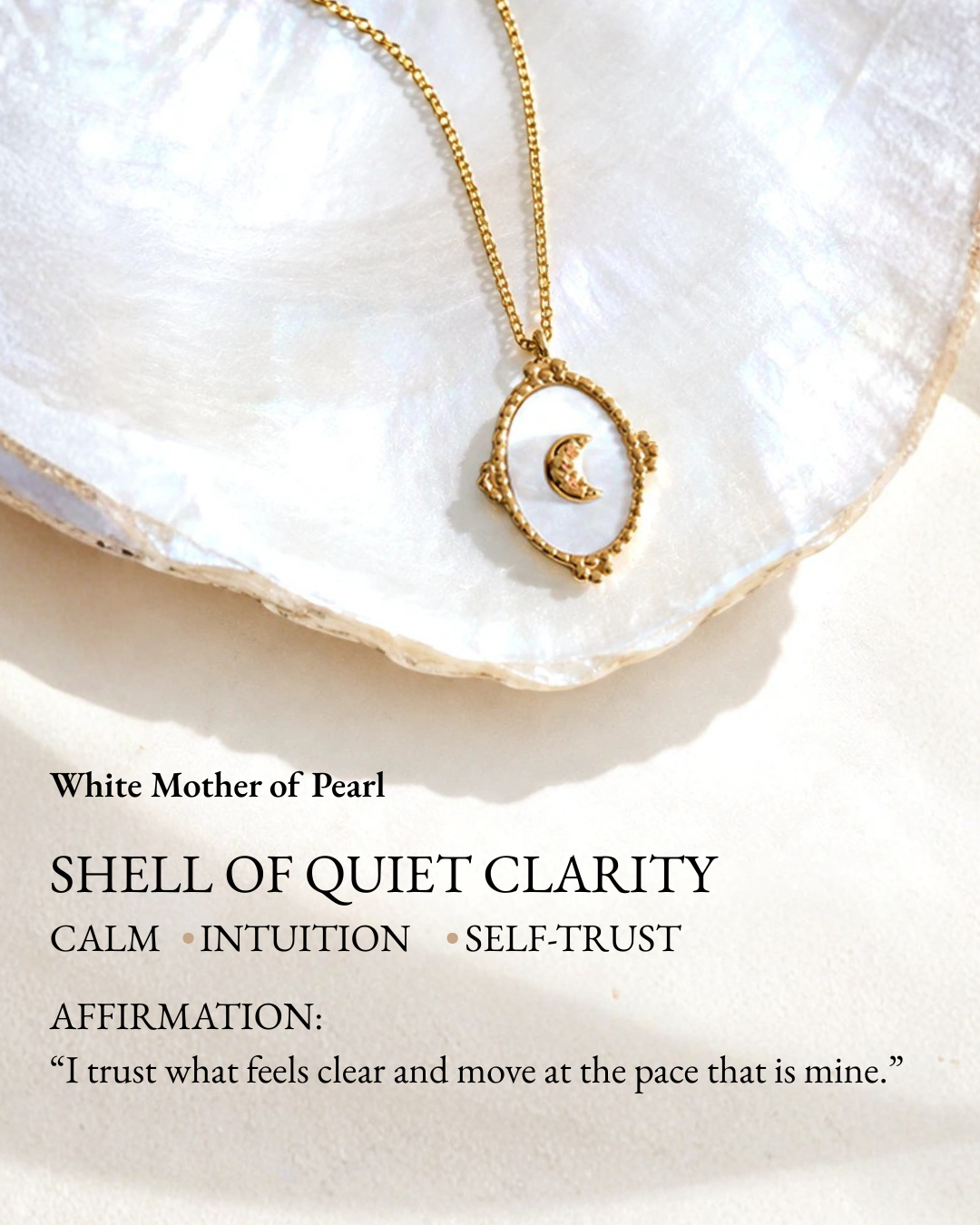 Tide Stone Pendant Necklace resting on a white mother-of-pearl shell meaning card