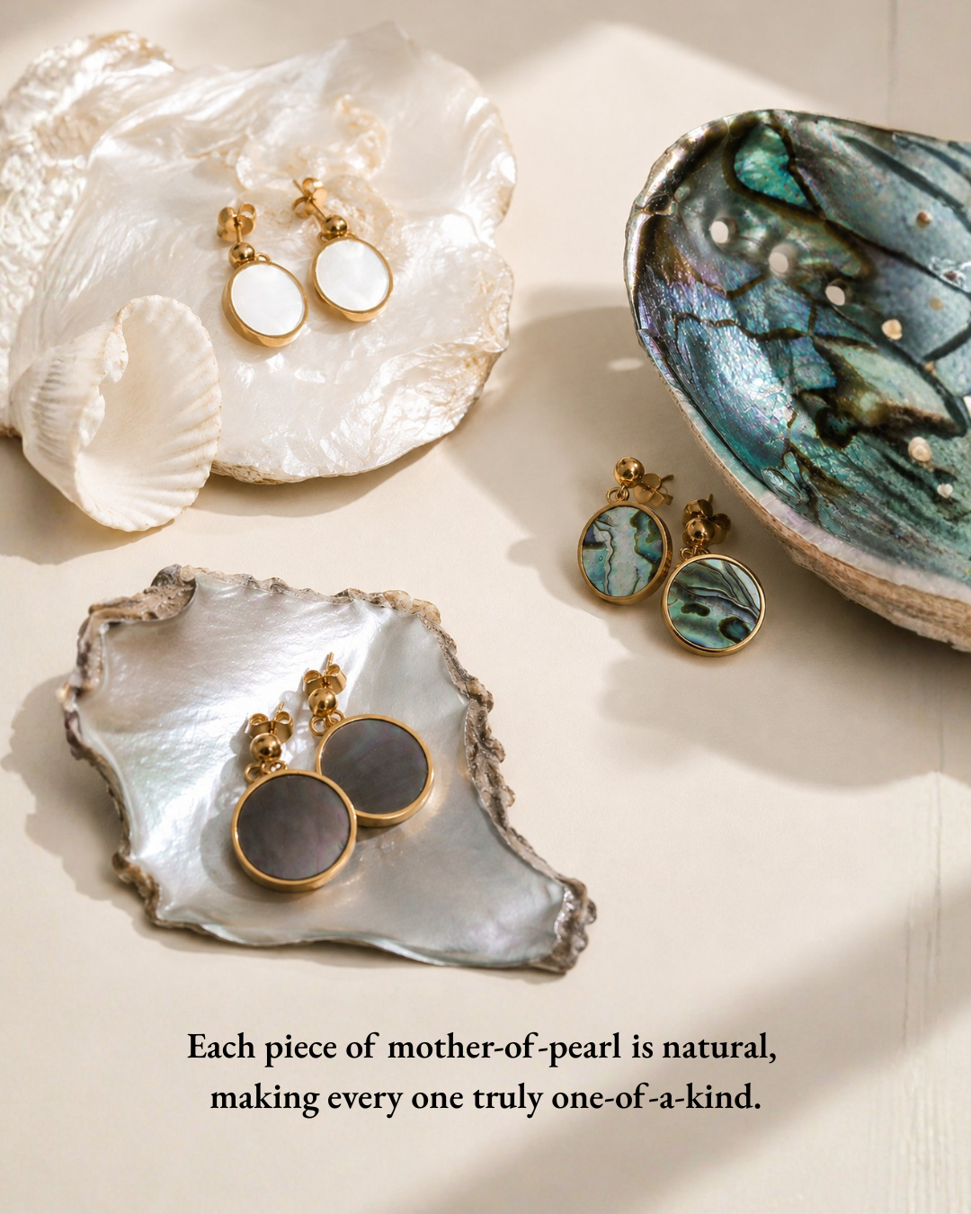 Mother-of-pearl stud earrings displayed with loose shells and abalone pieces