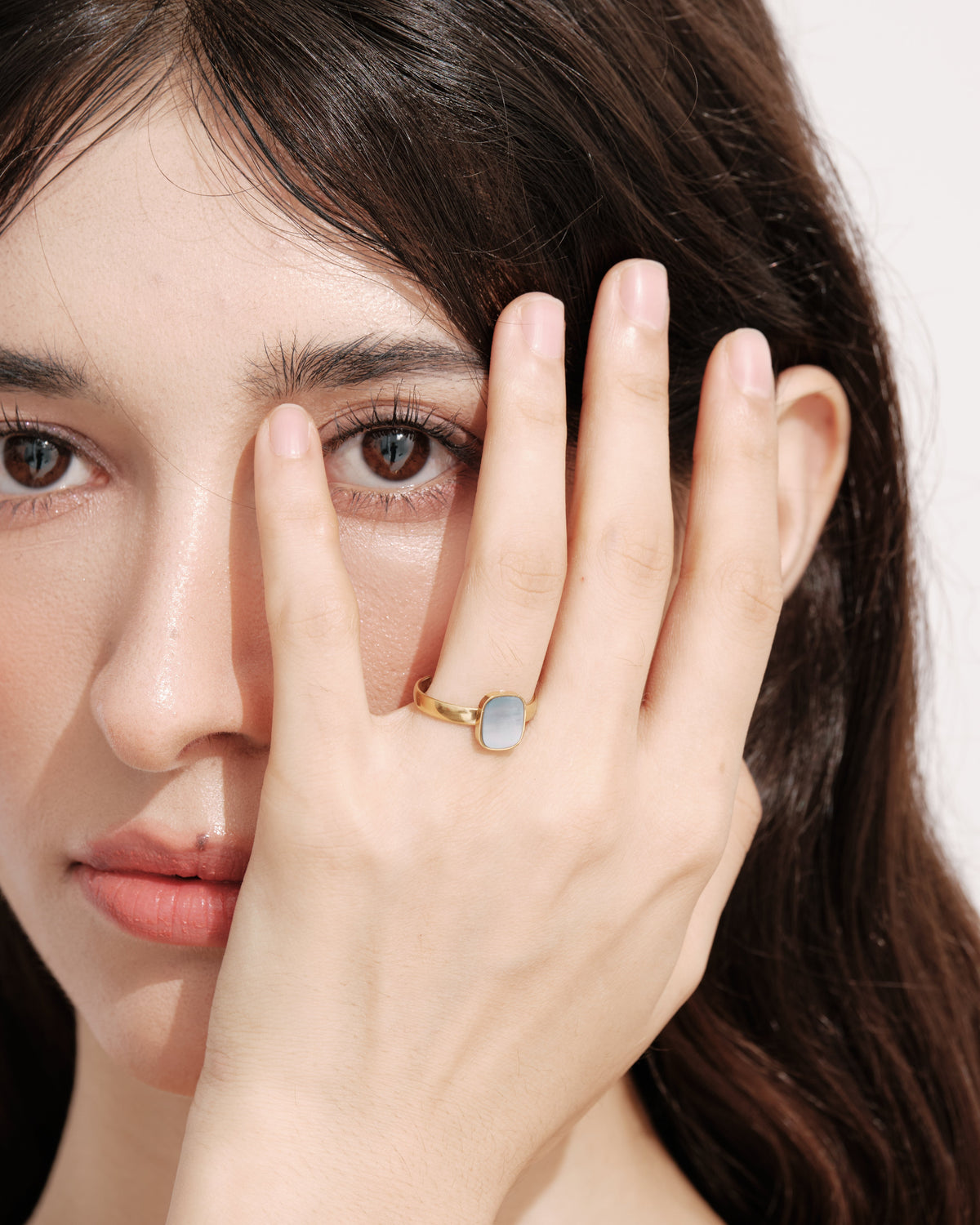 Model wearing the Mist Tide Ring on her index finger