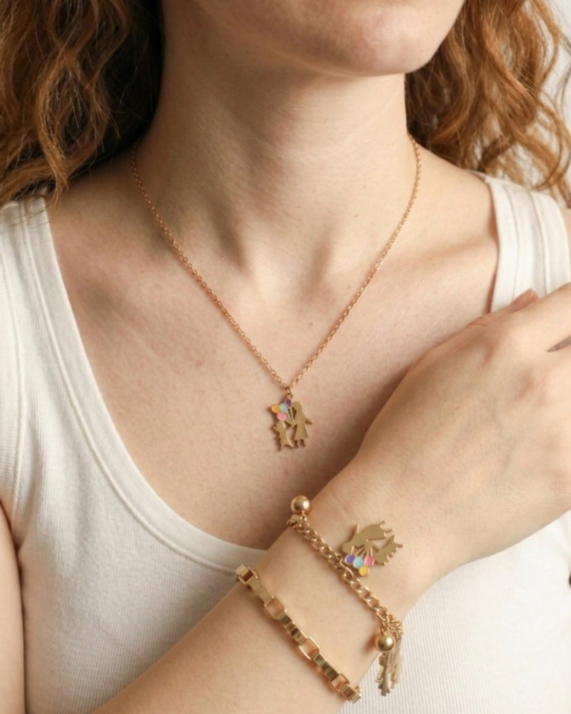 Model wearing Love is in the Air Mother & Daughter Necklace with matching Eternal Bond charm bracelet