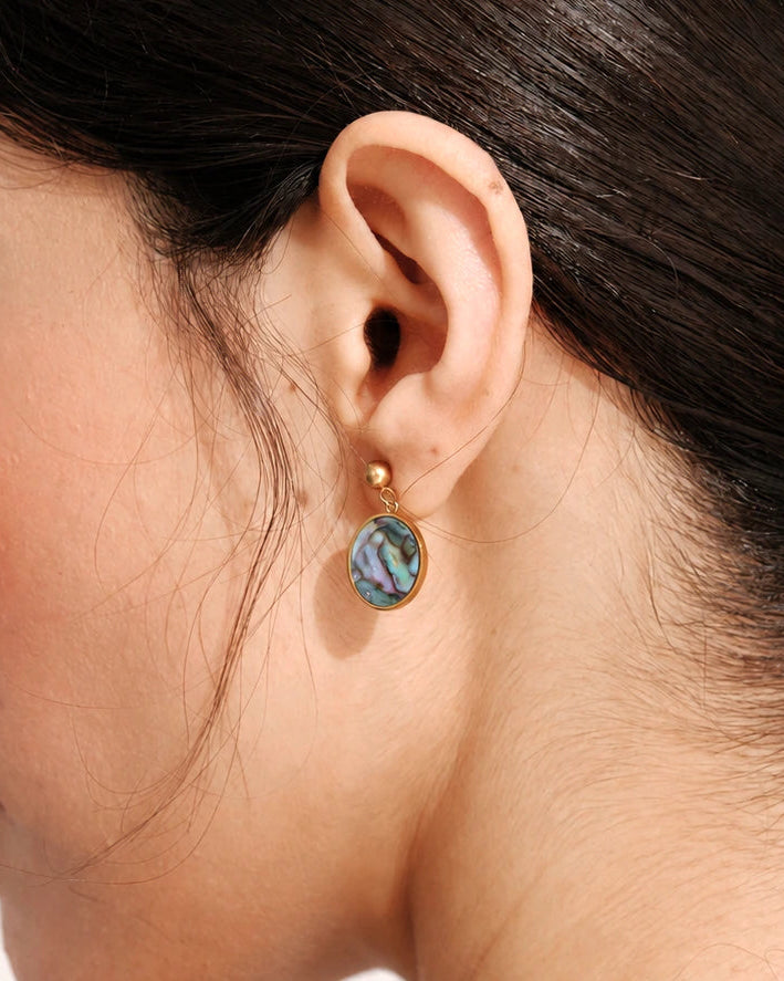 Side view of a model wearing a Tidal Stone Stud Earring