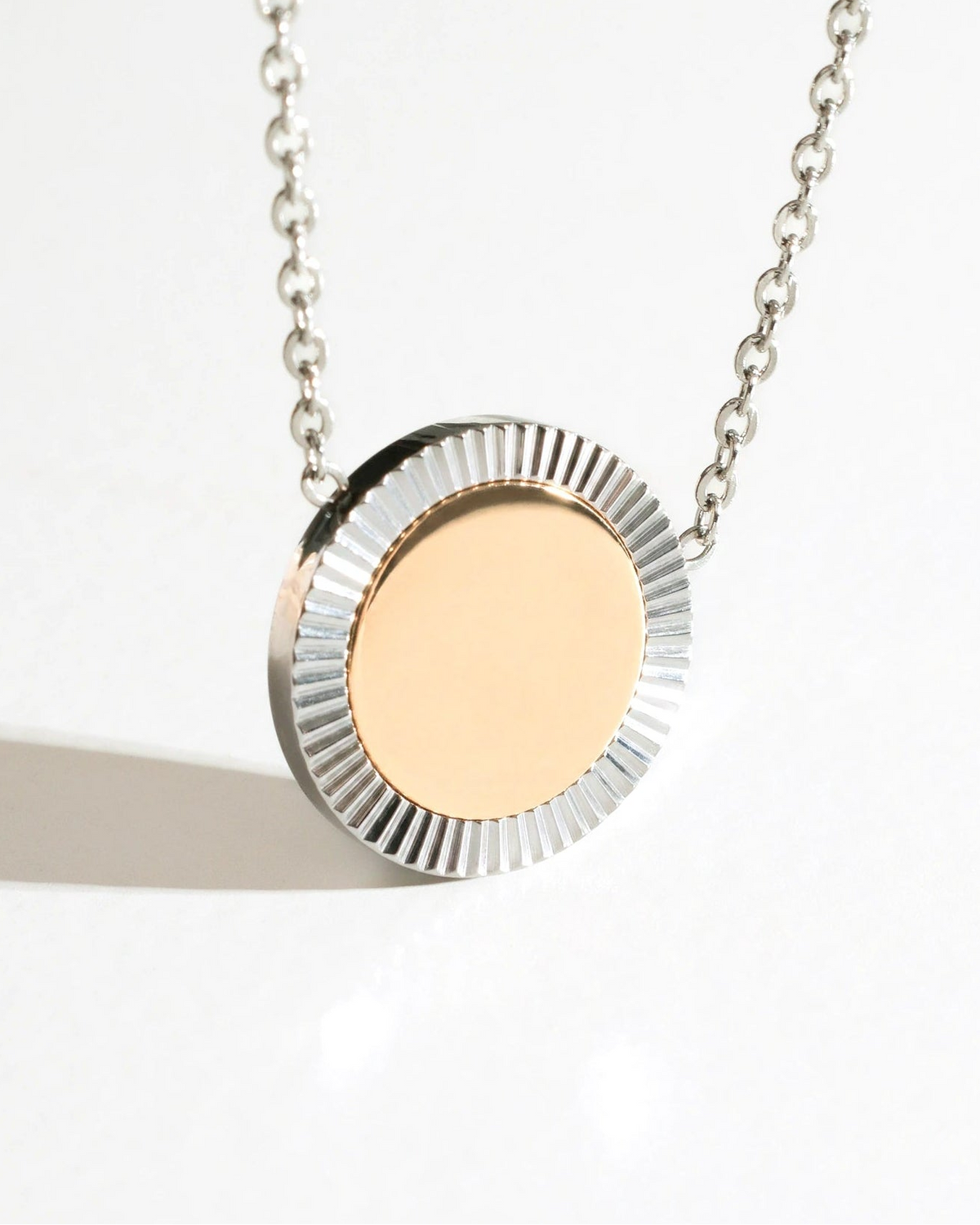 Close-up of Silver Reflection Pendant Necklace with a round mirror pendant