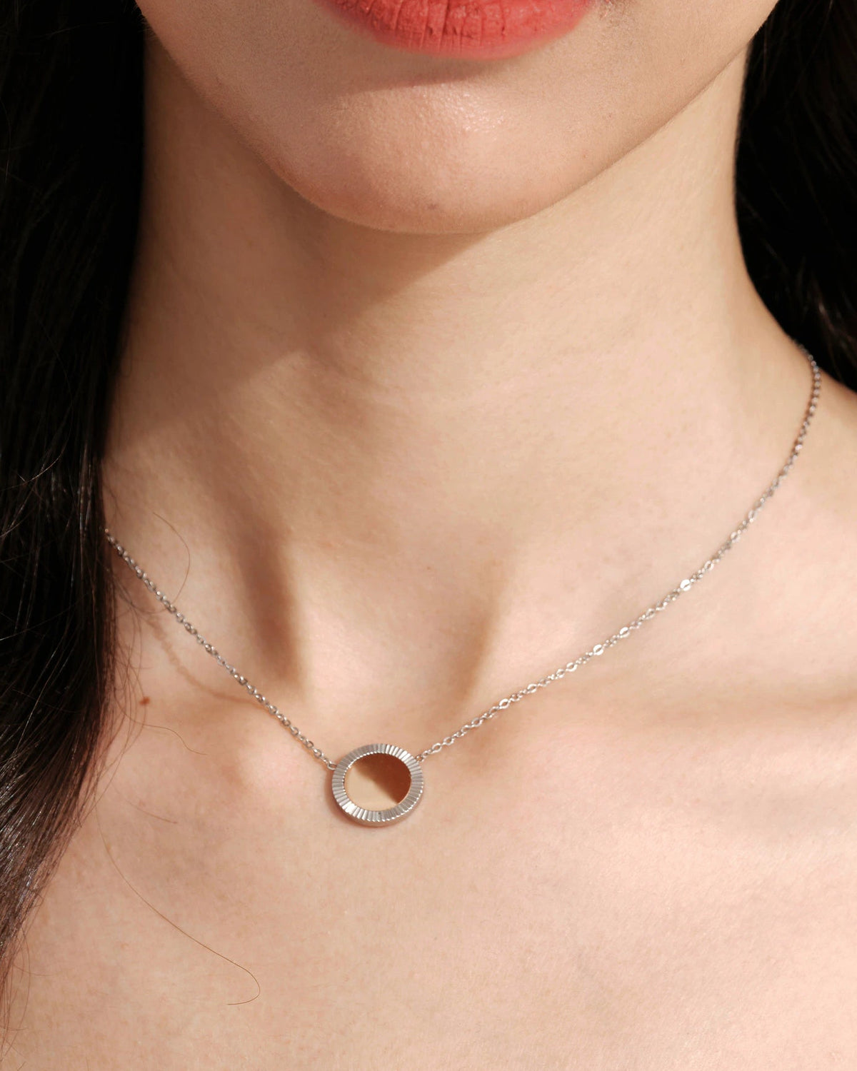Model wearing the Silver Reflection Pendant Necklace