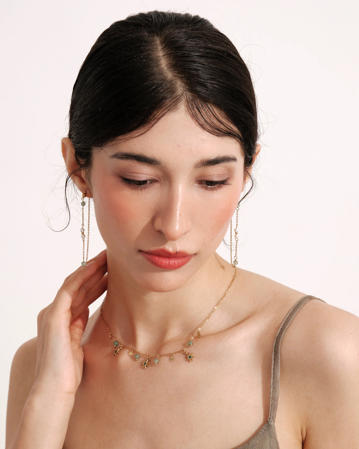 Model wearing the Willow Drift Drop Earrings