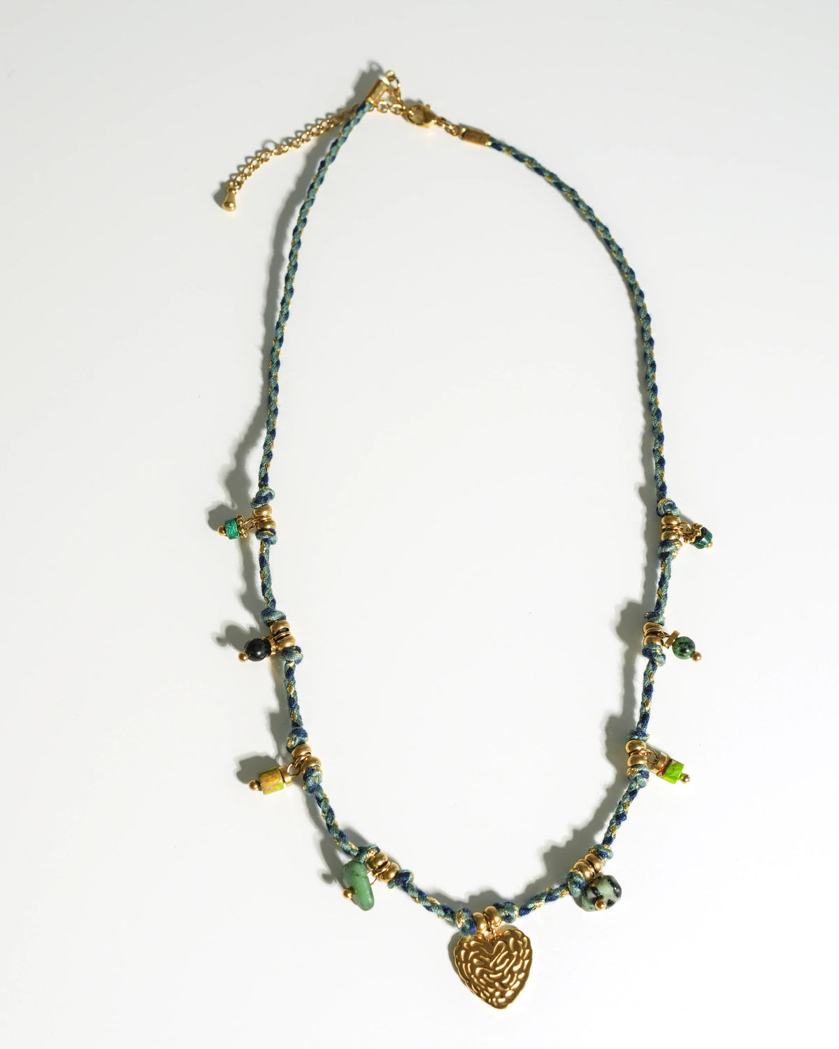 Full view of Verdant Amity Necklace with braided cord and gold heart pendant