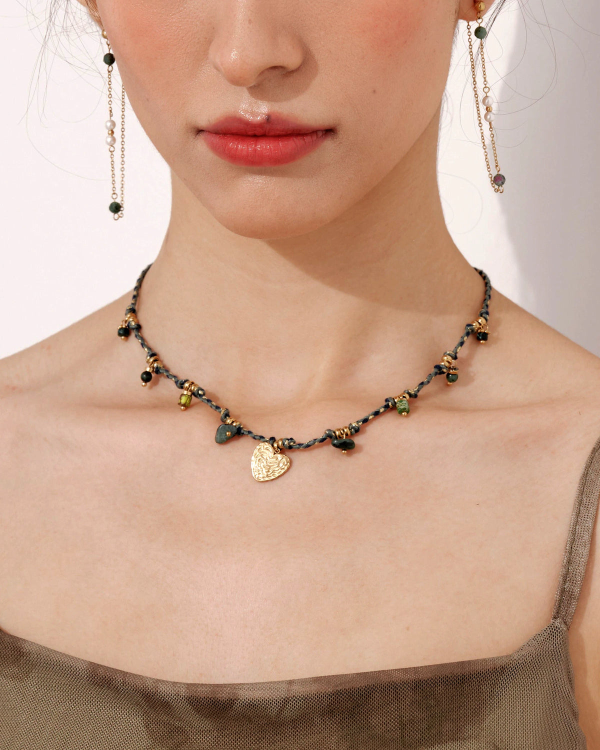 Close-up of model wearing the Verdant Amity Necklace