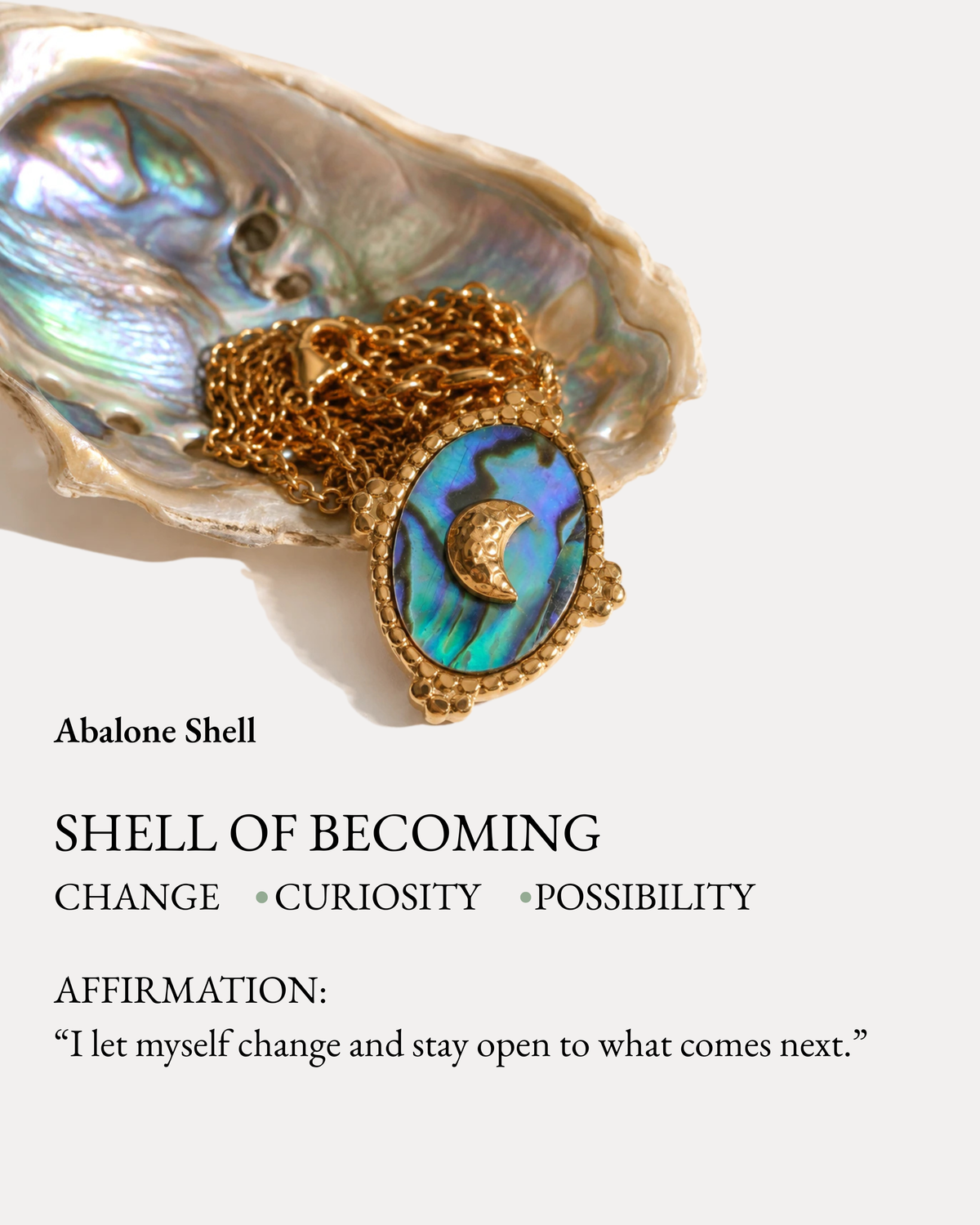 Tidal Stone Pendant Necklace with crescent detail resting on an abalone shell meaning card