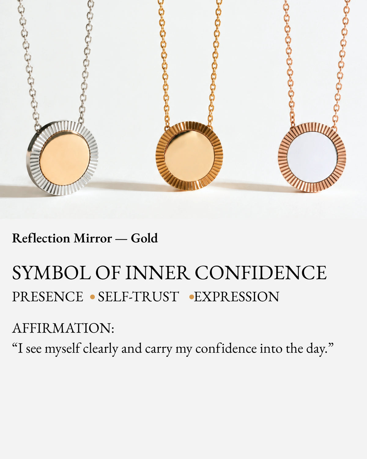 Gold Reflection pendant shown with silver and rose-gold Reflection necklaces on a meaning card