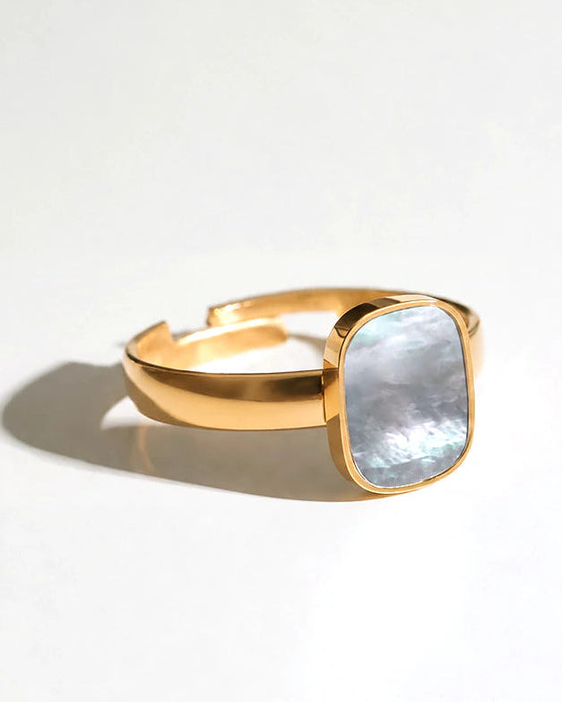 Front view of Mist Tide Ring on ivory fabric