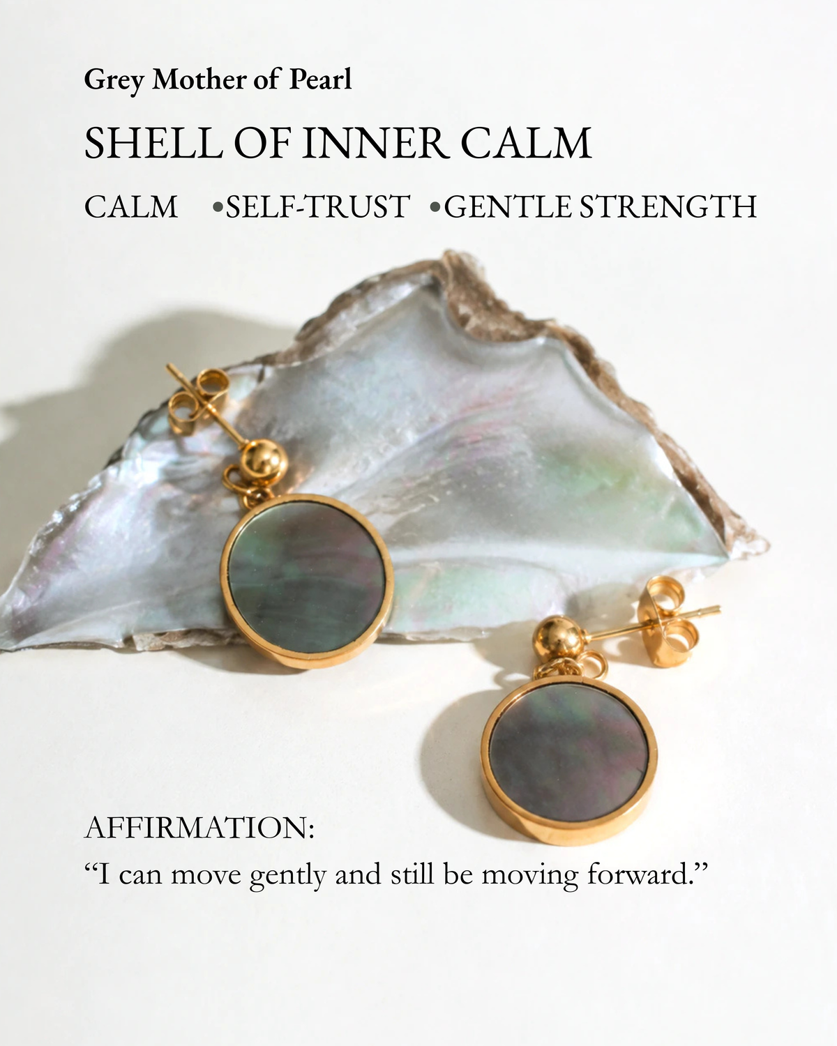 Mist Tide Stud Earrings displayed on grey mother-of-pearl shell with a meaning card